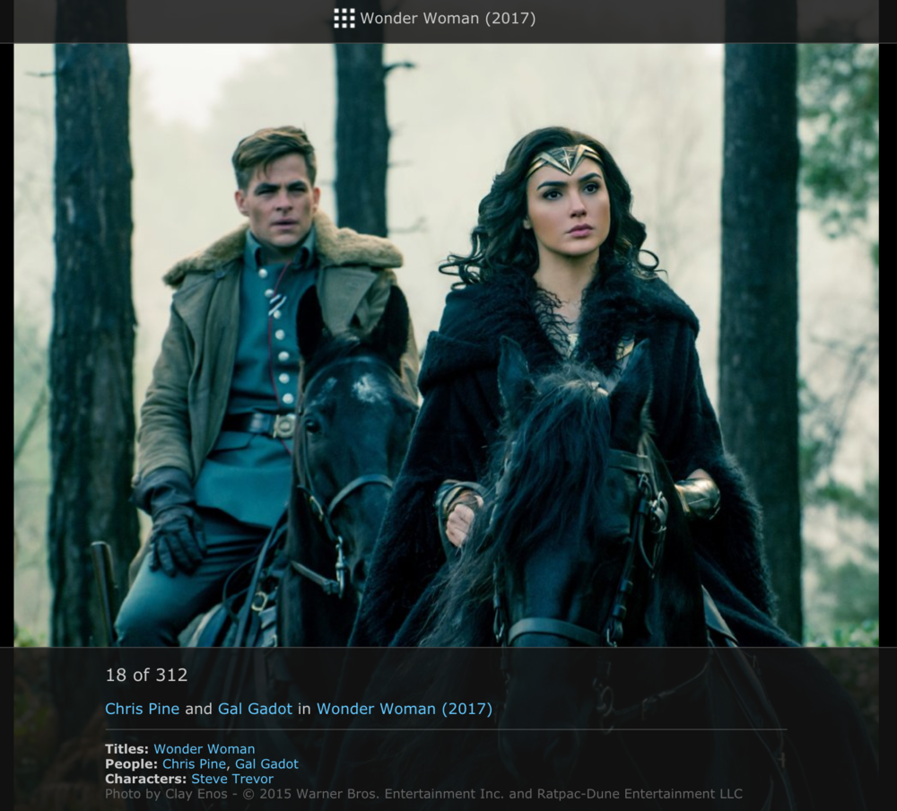 Wonder Woman and Steve Trevor riding horses through a forest